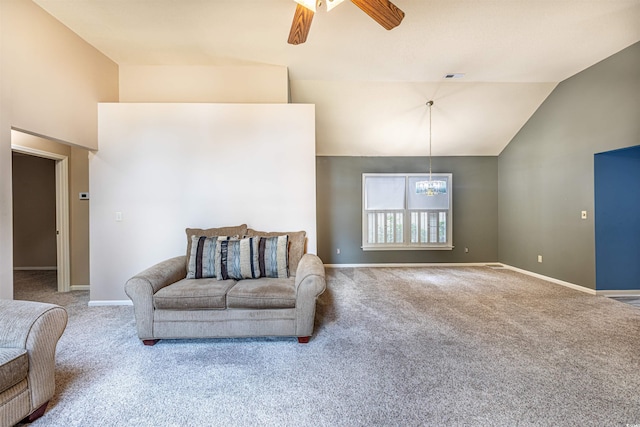 carpeted living area featuring baseboards, high vaulted ceiling, and ceiling fan with notable chandelier