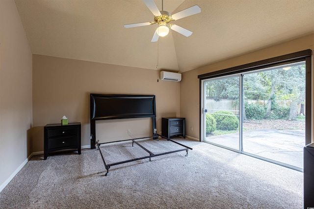 unfurnished bedroom with lofted ceiling, access to outside, a wall mounted AC, carpet, and baseboards