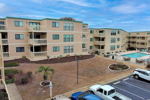 9661 Shore Dr Unit A-21, Myrtle Beach, SC 29572 - view of apartment building / complex with uncovered parking