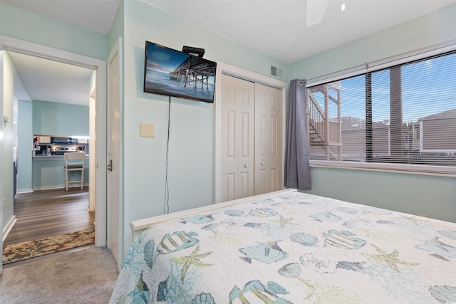 9661 Shore Dr Unit A-21, Myrtle Beach, SC 29572 - carpeted bedroom featuring a closet, ceiling fan, and baseboards