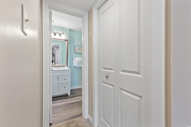 9661 Shore Dr Unit A-21, Myrtle Beach, SC 29572 - hall featuring baseboards and a sink