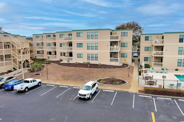 9661 Shore Dr Unit A-21, Myrtle Beach, SC 29572 - view of apartment building / complex with uncovered parking