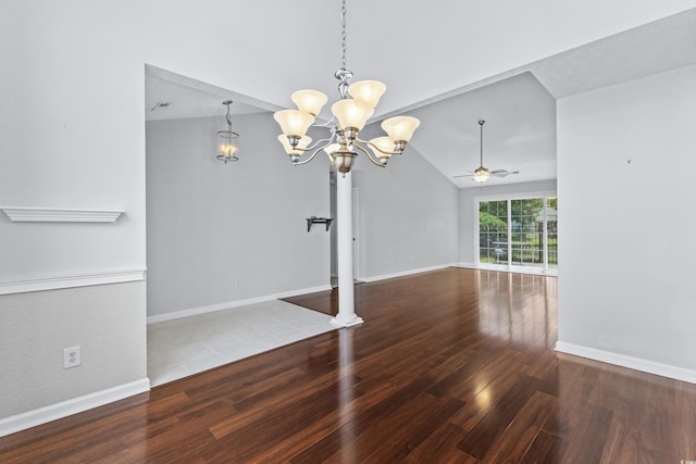 interior space featuring ceiling fan with notable chandelier, lofted ceiling, baseboards, and wood finished floors