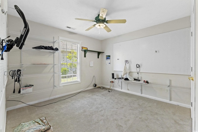 miscellaneous room with visible vents, baseboards, ceiling fan, and carpet floors