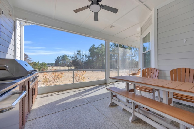 sunroom / solarium with ceiling fan