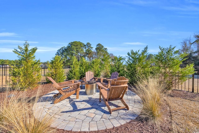 view of patio featuring fence