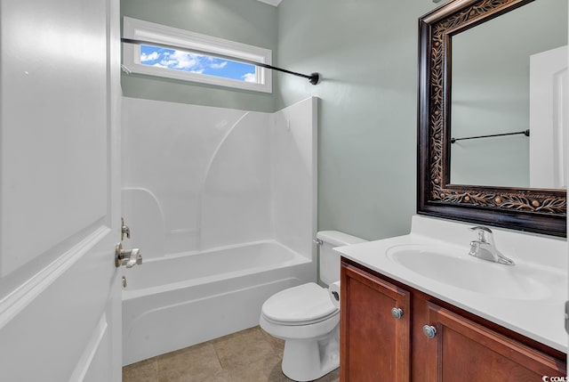 full bathroom featuring toilet, vanity,  shower combination, and tile patterned floors