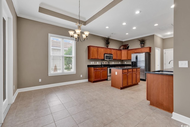 kitchen featuring stainless steel appliances, crown molding, a sink, recessed lighting, and brown cabinets