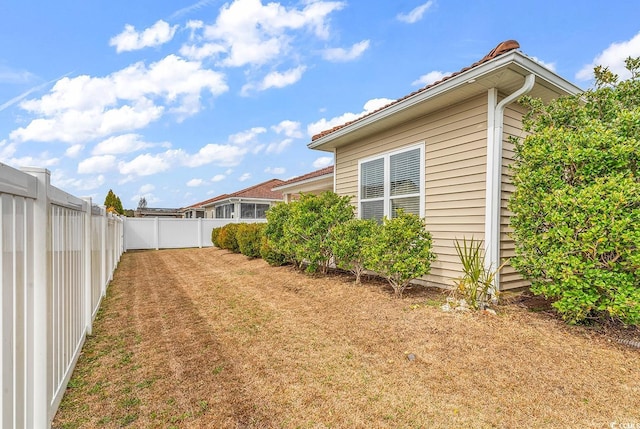 view of yard featuring a fenced backyard