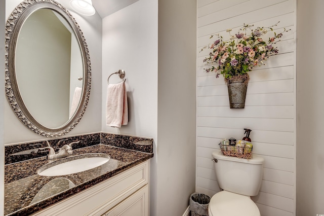 bathroom with toilet and vanity