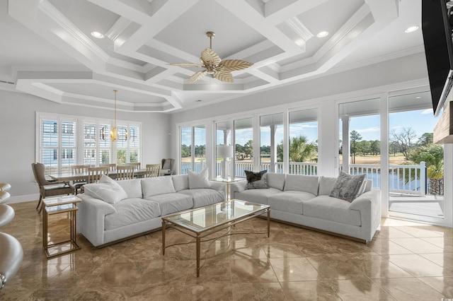 living room featuring coffered ceiling, crown molding, and ceiling fan