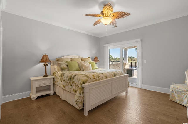 bedroom with baseboards, wood finished floors, access to exterior, and crown molding