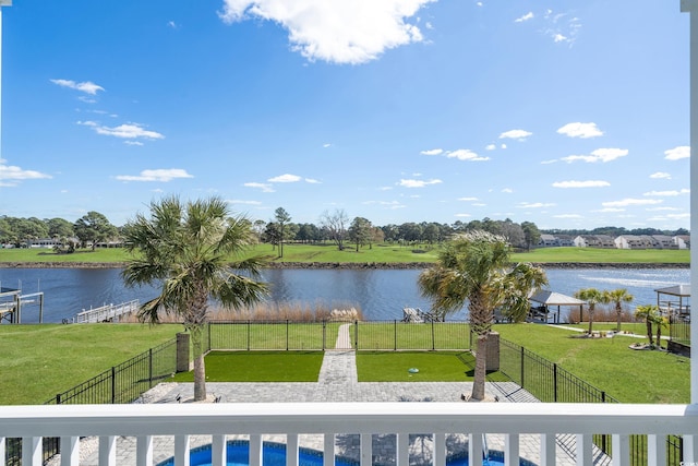 view of water feature with fence