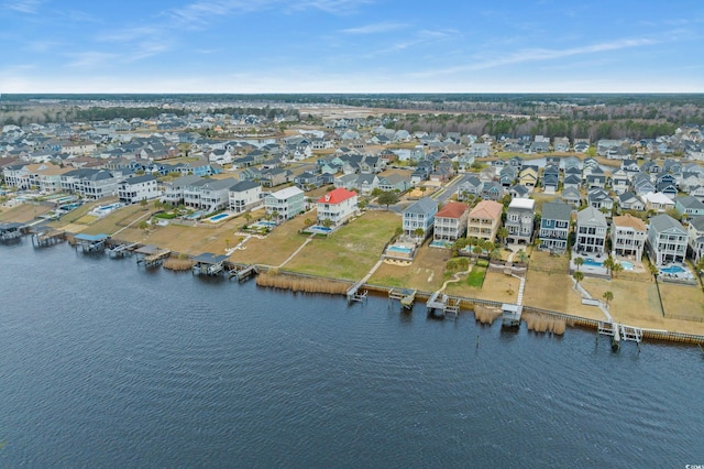 aerial view featuring a residential view and a water view