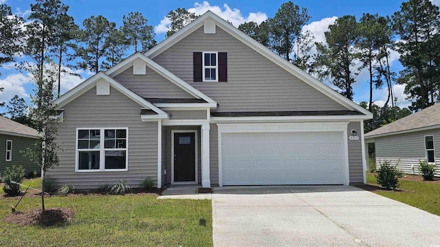 traditional home with driveway and a front lawn