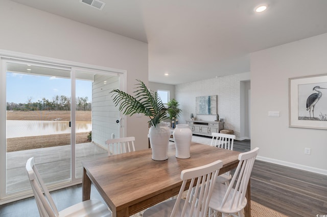 dining area featuring dark wood-style flooring, recessed lighting, and baseboards