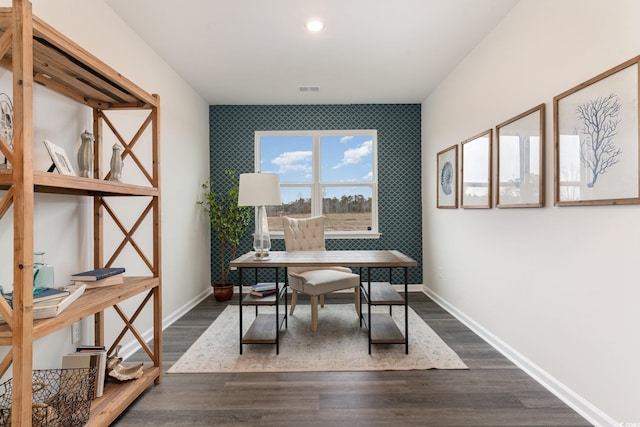office area with an accent wall, baseboards, dark wood-type flooring, and recessed lighting