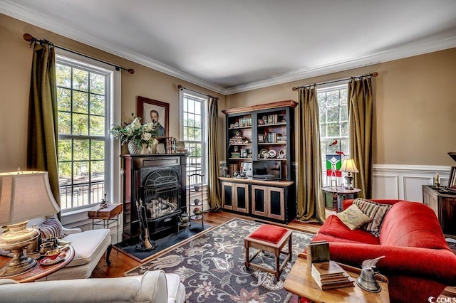 1539 Old Town Ave, Georgetown, SC 29440 - sitting room with plenty of natural light, ornamental molding, wood finished floors, and a wainscoted wall