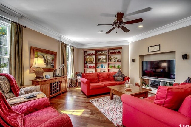 living area with recessed lighting, crown molding, ceiling fan, and wood finished floors