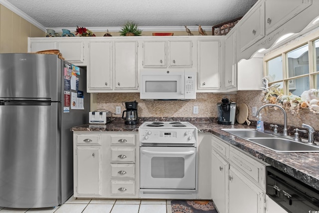 kitchen featuring white appliances, ornamental molding, a sink, a textured ceiling, and white cabinetry