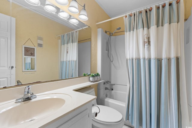 bathroom featuring toilet, vanity, and shower / bath combination with curtain