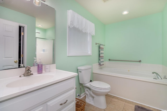 bathroom featuring tile patterned floors, toilet, a bath, an enclosed shower, and vanity