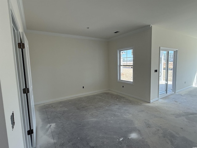 unfurnished room featuring visible vents, baseboards, and crown molding