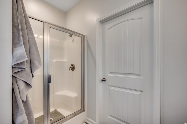 full bathroom with a stall shower