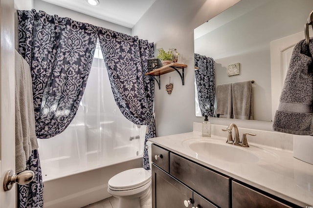 full bath featuring vanity, shower / bath combination with curtain, and toilet