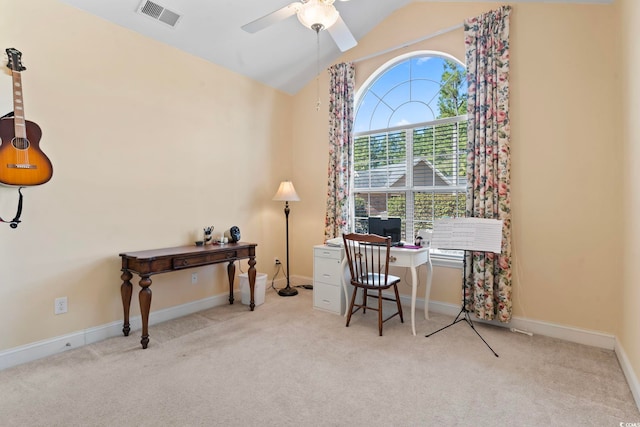 office area with visible vents, ceiling fan, carpet, and vaulted ceiling