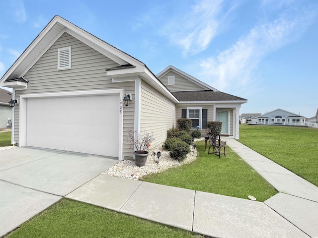 ranch-style house with driveway, an attached garage, and a front lawn