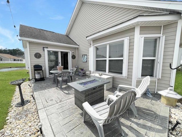 view of patio / terrace with a fire pit