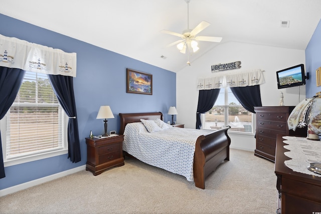 carpeted bedroom with visible vents, baseboards, a ceiling fan, and vaulted ceiling