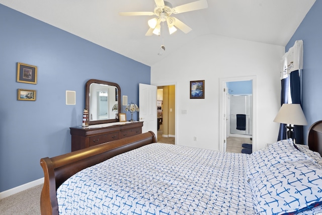 carpeted bedroom with vaulted ceiling, a ceiling fan, baseboards, and connected bathroom