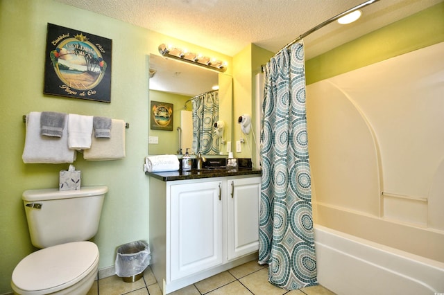 2007 S Ocean Blvd Unit 1106, Myrtle Beach, SC 29577 - bathroom featuring tile patterned floors, a textured ceiling, toilet, vanity, and shower / bath combo