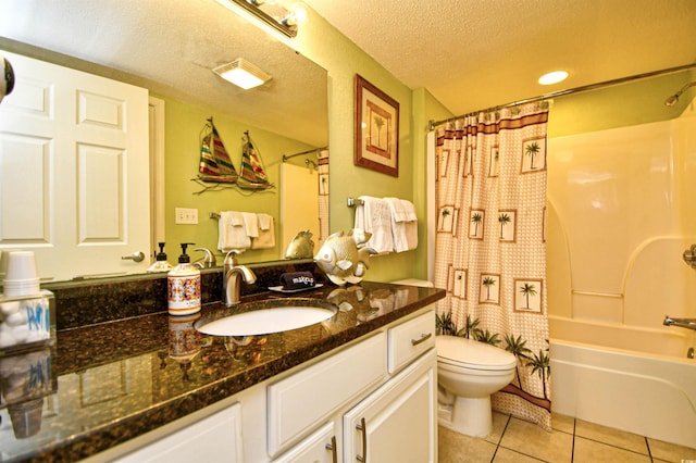 2007 S Ocean Blvd Unit 1106, Myrtle Beach, SC 29577 - bathroom with toilet, tile patterned flooring, vanity, shower / tub combo with curtain, and a textured ceiling