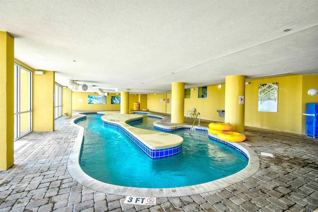 2007 S Ocean Blvd Unit 1106, Myrtle Beach, SC 29577 - indoor community pool featuring a patio area