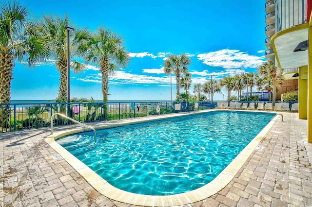 2007 S Ocean Blvd Unit 1106, Myrtle Beach, SC 29577 - community pool featuring fence and a patio area