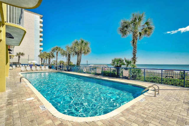 2007 S Ocean Blvd Unit 1106, Myrtle Beach, SC 29577 - community pool featuring fence and a patio area