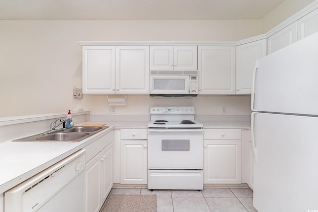 242 Sun Colony Blvd Unit 203, Longs, SC 29568 - kitchen featuring light tile patterned floors, white appliances, a sink, light countertops, and white cabinets