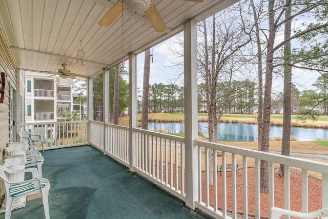 242 Sun Colony Blvd Unit 203, Longs, SC 29568 - unfurnished sunroom featuring a water view and ceiling fan