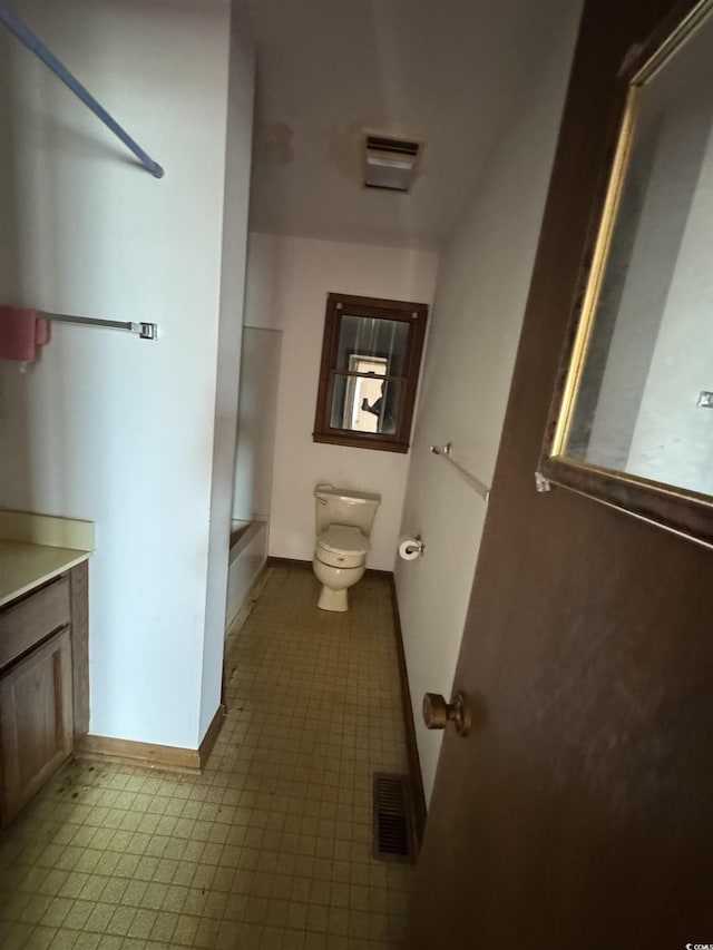 full bathroom with a shower, visible vents, toilet, and vanity