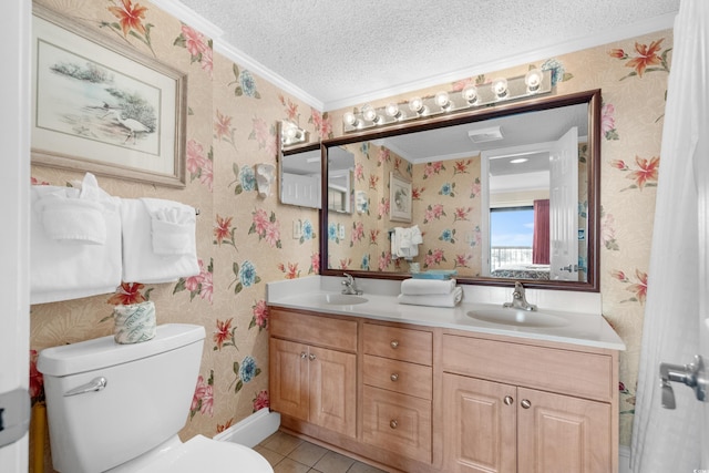 bathroom with wallpapered walls and a sink