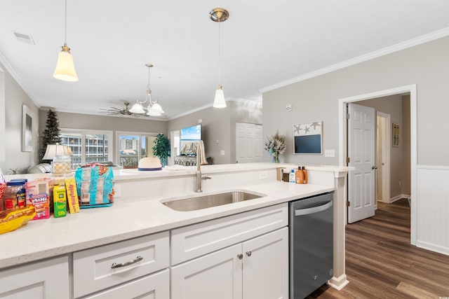 kitchen with crown molding, dark wood finished floors, dishwasher, white cabinetry, and a sink