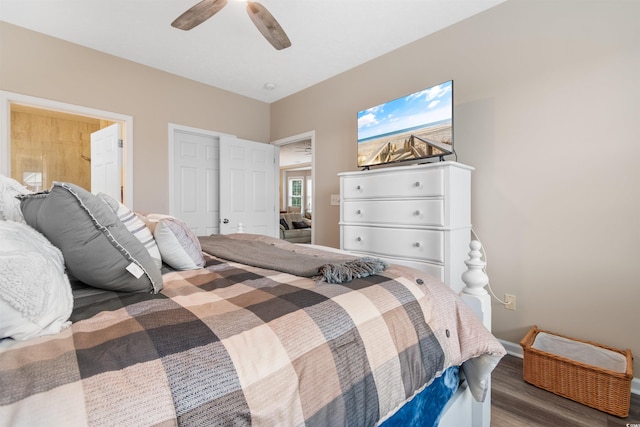 bedroom with a ceiling fan and wood finished floors