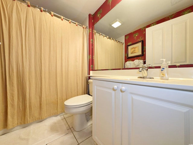 full bath featuring tile patterned floors, toilet, and vanity