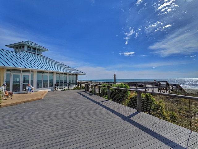 deck featuring a water view