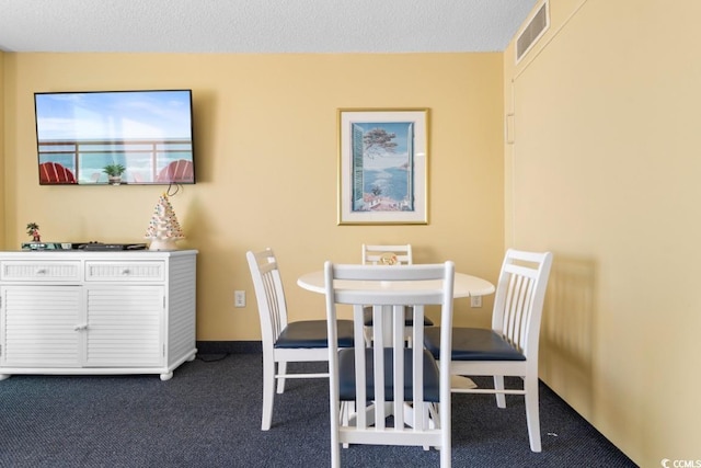300 N Ocean Blvd Unit 731, North Myrtle Beach, SC 29582 - dining area with dark colored carpet
