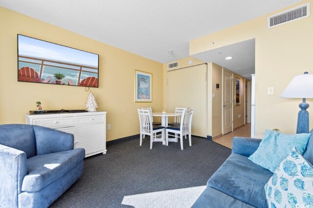 300 N Ocean Blvd Unit 731, North Myrtle Beach, SC 29582 - carpeted living room featuring baseboards