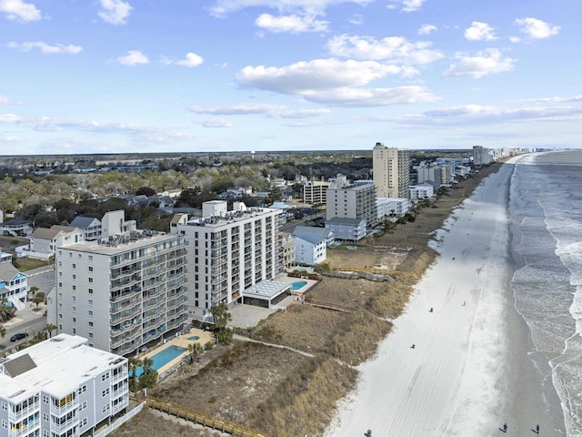 aerial view with a view of city, a beach view, and a water view